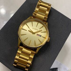 Nixon gold Sentry SS watch